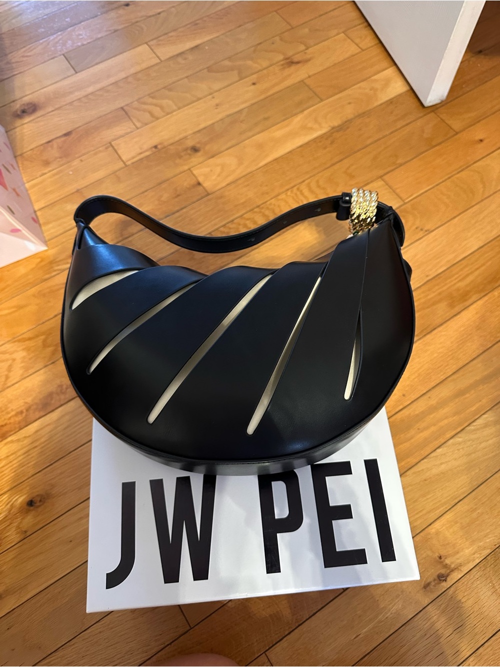 JW PEI Black Crescent Shoulder Bag with Gold Accent Braided Detail